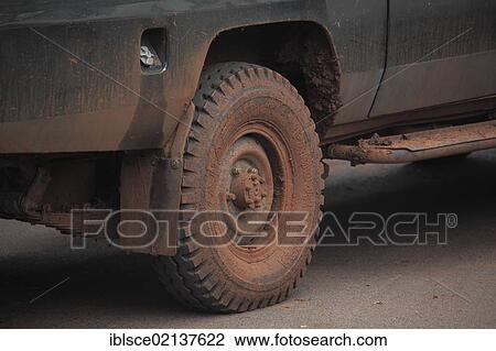 Jeep tyres after driving along muddy slopes, Tanzania, Africa View Large Photo Image Stock Image - Jeep tyres after driving along muddy slopes, Tanzania, Africa. Fotosearch