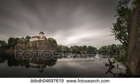 Stock Photo - Kirchberg with mountain church and water tower, cloudy sky, Beucha, Brandis, Saxony, Germany, Europe. Fotosearch