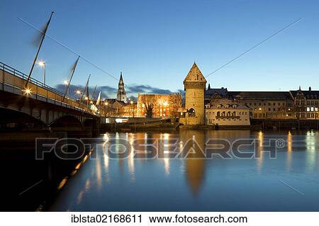 Konstanz or Constance at dusk with the old bridge over the Rhine, church and Rheintorturm tower, Lake Constance, Baden-Wuerttemberg, Germany, Europe View Large Photo Image Stock Image - Konstanz or Constance at dusk with the old bridge over the Rhine, church and Rheintorturm tower, Lake Constance, Baden-Wuerttemberg, Germany, Europe. Fotosearch