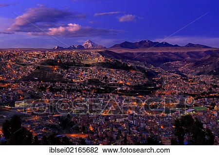 Stock Image - La Paz during the blue hour with the Andes Mountains, La Paz, Bolivia, South America. Fotosearch