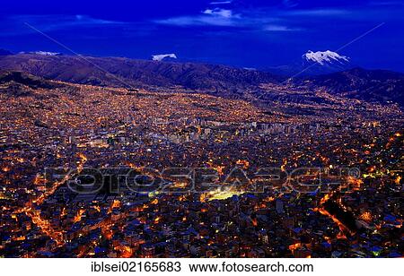 Stock Image - La Paz during the blue hour with the Andes Mountains, La Paz, Bolivia, South America. Fotosearch