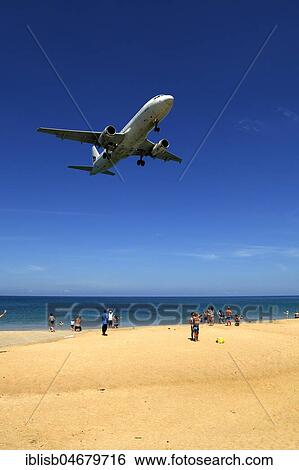 Landing approach over sandy beach, Mai Kao Beach, Phuket, Thailand, Asia View Large Photo Image Stock Photograph - Landing approach over sandy beach, Mai Kao Beach, Phuket, Thailand, Asia. Fotosearch