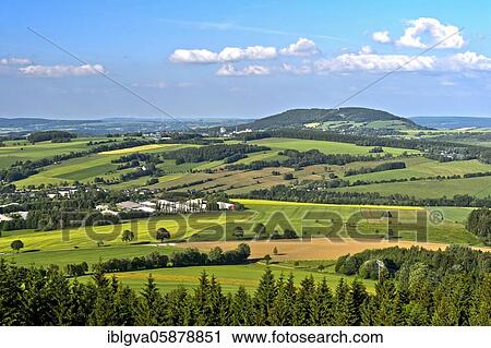 Landscape form middle Erzgebirge, panoramic view from Scheibenberg over the village Schlettau to Pöhlberg near Annaberg-Buchholz, Scheibenberg, Erzgebirge, Saxony, Germany, Europe View Large Photo Image Stock Image - Landscape form middle Erzgebirge, panoramic view from Scheibenberg over the village Schlettau to Pöhlberg near Annaberg-Buchholz, Scheibenberg, Erzgebirge, Saxony, Germany, Europe. Fotosearch