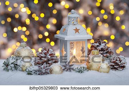 Stock Image - Lantern with Christmas decoration. Fotosearch