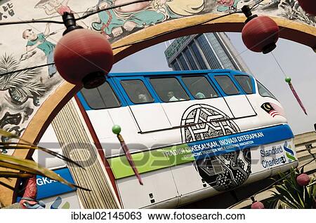 Stock Image - Lanterns and monorail at the entrance of Koon Yam Guanyin Temple, Chinatown, Kuala Lumpur, Malaysia, Southeast Asia, Asia. Fotosearch