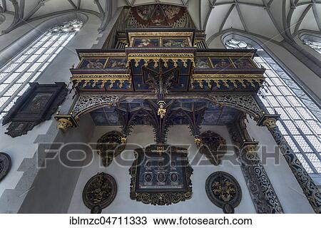 Stock Image - Late Renaissance side organ seen from below, in the late Gothic St. George church, built 1427 to 1505, Nördlingen, Bavaria, Germany, Europe. Fotosearch