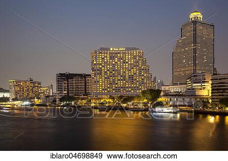 Stock Photo - Lebua State Tower with hotel on the Chao Praya River, evening shot, Bangkok, Thailand, Asia. Fotosearch