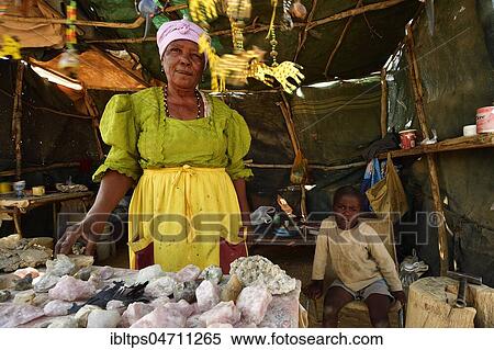 Local saleswoman in her sales stand near Spitzkoppe, Erongo region, Damaraland, Namibia, Africa View Large Photo Image Stock Photography - Local saleswoman in her sales stand near Spitzkoppe, Erongo region, Damaraland, Namibia, Africa. Fotosearch