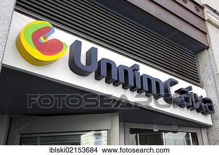 Logo and logotype of the Spanish bank Unnim Caixa, Madrid, Spain, Europe View Large Photo Image Picture - Logo and logotype of the Spanish bank Unnim Caixa, Madrid, Spain, Europe. Fotosearch