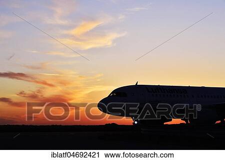 Lufthansa, Airbus, A319-100, taxiing from Runway North to Terminal 2, Sunset, Munich Airport, Upper Bavaria, Bavaria, Germany, Europe View Large Photo Image Stock Image - Lufthansa, Airbus, A319-100, taxiing from Runway North to Terminal 2, Sunset, Munich Airport, Upper Bavaria, Bavaria, Germany, Europe. Fotosearch