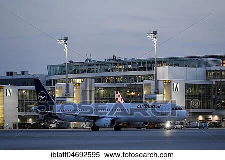 Lufthansa, Airbus, A321-100, New Livery, taxiing at dusk in front of Terminal 2, Munich Airport, Upper Bavaria, Bavaria, Germany, Europe View Large Photo Image Stock Photography - Lufthansa, Airbus, A321-100, New Livery, taxiing at dusk in front of Terminal 2, Munich Airport, Upper Bavaria, Bavaria, Germany, Europe. Fotosearch