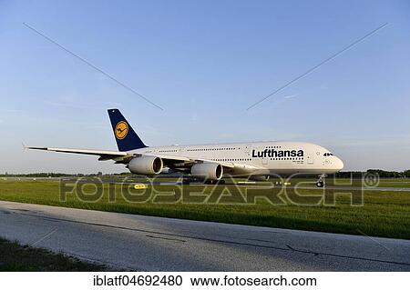 Stock Image - Lufthansa, Airbus, A380-800, taxiway (taxiway) to runway south, for take-off, Munich Airport, Upper Bavaria, Bavaria, Germany, Europe. Fotosearch