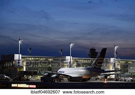 Lufthansa, Airbus, A380-800 with Push Back Truck in front of Terminal 2, dusk, Munich Airport, Upper Bavaria, Bavaria, Germany, Europe View Large Photo Image Stock Photo - Lufthansa, Airbus, A380-800 with Push Back Truck in front of Terminal 2, dusk, Munich Airport, Upper Bavaria, Bavaria, Germany, Europe. Fotosearch