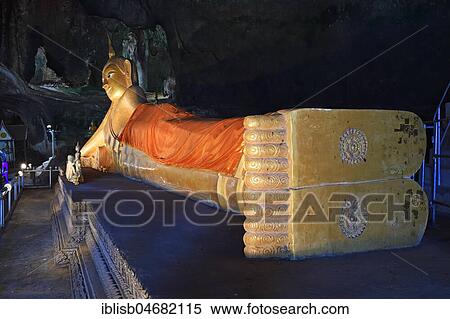 Stock Photography - Lying golden Buddha in the cave temple Wat Tham Suwan Khuha, Phang Nga, Thailand, Asia. Fotosearch