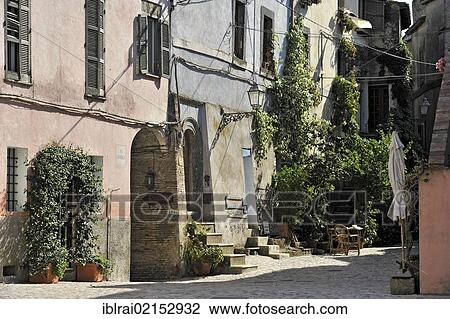 Main street, Via Garibaldi, medieval town of Vecchia Calcata, valley of Valle del Treja, Lazio, Italy, Europe View Large Photo Image Stock Image - Main street, Via Garibaldi, medieval town of Vecchia Calcata, valley of Valle del Treja, Lazio, Italy, Europe. Fotosearch