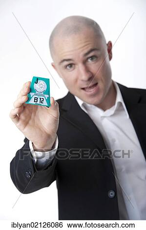 Man presenting Austrian road tax vignette 2012 View Large Photo Image Stock Photograph - Man presenting Austrian road tax vignette 2012. Fotosearch