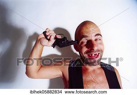 Man, Russian Roulette, Gun, Bald, Temple, Head, Berlin, Germany, Europe View Large Photo Image Picture - Man, Russian Roulette, Gun, Bald, Temple, Head, Berlin, Germany, Europe. Fotosearch