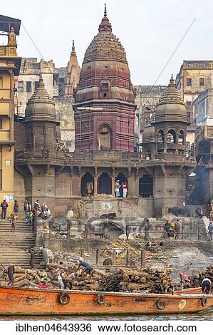 Manikarnika Ghat, main cremation ground at the ghats of Ganges river, Varanasi, Uttar Pradesh, India, Asia View Large Photo Image Stock Photograph - Manikarnika Ghat, main cremation ground at the ghats of Ganges river, Varanasi, Uttar Pradesh, India, Asia. Fotosearch