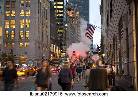 Many people on 5th Avenue close to Trump Tower in the evening, Midtown, Manhattan, New York City, USA, North America View Large Photo Image Stock Photograph - Many people on 5th Avenue close to Trump Tower in the evening, Midtown, Manhattan, New York City, USA, North America. Fotosearch