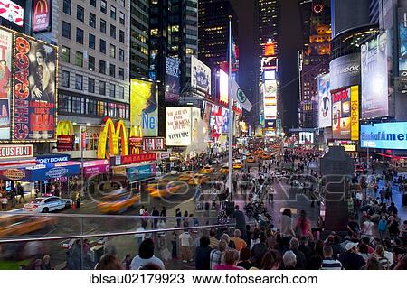 Many people, yellow taxis, colourful neon signs, intersection of Broadway and 7th Avenue, Times Square pedestrian zone, Midtown, Manhattan, New York City, USA, North America View Large Photo Image Stock Image - Many people, yellow taxis, colourful neon signs, intersection of Broadway and 7th Avenue, Times Square pedestrian zone, Midtown, Manhattan, New York City, USA, North America. Fotosearch