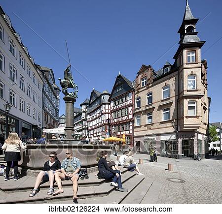 Market well and commercial buildings on the market square, Upper Town, Marburg, Hesse, Germany, Europe, PublicGround, Europe View Large Photo Image Picture - Market well and commercial buildings on the market square, Upper Town, Marburg, Hesse, Germany, Europe, PublicGround, Europe. Fotosearch