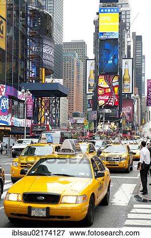 Metropolis, high-rise buildings and bright neon avertising signs, yellow cabs, taxis, intersection of Broadway and 7th Avenue, Times Square, Midtown, Manhattan, New York City, USA, North America, America, North America View Large Photo Image Stock Photo - Metropolis, high-rise buildings and bright neon avertising signs, yellow cabs, taxis, intersection of Broadway and 7th Avenue, Times Square, Midtown, Manhattan, New York City, USA, North America, America, North America. Fotosearch