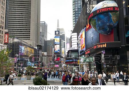 Stock Photo - Metropolis, high-rise buildings and bright neon avertising signs, intersection of Broadway and 7th Avenue, pedestrian zone, Times Square, Midtown, Manhattan, New York City, USA, North America, America, North America. Fotosearch