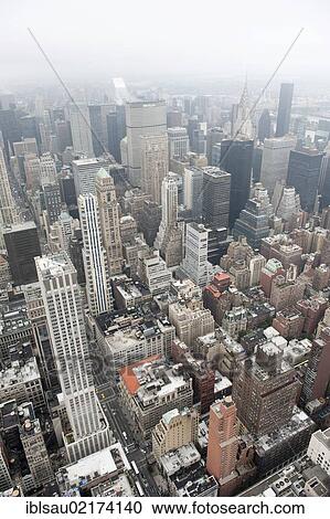 Metropolis, sea of houses, view from the Empire State Building to the skyscrapers of Midtown in fog, skyscrapers, Manhattan, New York City, USA, North America, America, North America View Large Photo Image Stock Image - Metropolis, sea of houses, view from the Empire State Building to the skyscrapers of Midtown in fog, skyscrapers, Manhattan, New York City, USA, North America, America, North America. Fotosearch