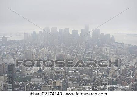 Metropolis, sea of houses, view from the Empire State Building to the skyscrapers of the Financial District in fog and mist, skyscrapers, Manhattan, New York City, USA, North America, America, North America View Large Photo Image Stock Image - Metropolis, sea of houses, view from the Empire State Building to the skyscrapers of the Financial District in fog and mist, skyscrapers, Manhattan, New York City, USA, North America, America, North America. Fotosearch