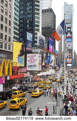Metropolis, traffic, high-rise buildings and bright neon advertising signs, yellow cabs, taxis, intersection of Broadway and 7th Avenue, Times Square, Midtown, Manhattan, New York, USA, North America View Large Photo Image Stock Photo - Metropolis, traffic, high-rise buildings and bright neon advertising signs, yellow cabs, taxis, intersection of Broadway and 7th Avenue, Times Square, Midtown, Manhattan, New York, USA, North America. Fotosearch