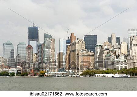 Metropolis, view of high-rise buildings and skyline, Financial District, Battery Park, One World Trade Center under construction, Freedom Tower, New York City, USA, North America, America, North America View Large Photo Image Stock Image - Metropolis, view of high-rise buildings and skyline, Financial District, Battery Park, One World Trade Center under construction, Freedom Tower, New York City, USA, North America, America, North America. Fotosearch
