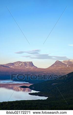 Stock Image - Midnight sun at the Tornetraesk with the Lapporten mountain, Abisko National Park, Lapland, northern Sweden, Sweden, Scandinavia, Europe. Fotosearch
