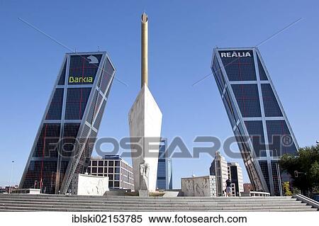 Modern office towers, Puerta de Europa, also called Torres Kio, with the monument to Jose Calvo Sotelo, Plaza Castilla square, Madrid, Spain, Europe View Large Photo Image Stock Photography - Modern office towers, Puerta de Europa, also called Torres Kio, with the monument to Jose Calvo Sotelo, Plaza Castilla square, Madrid, Spain, Europe. Fotosearch