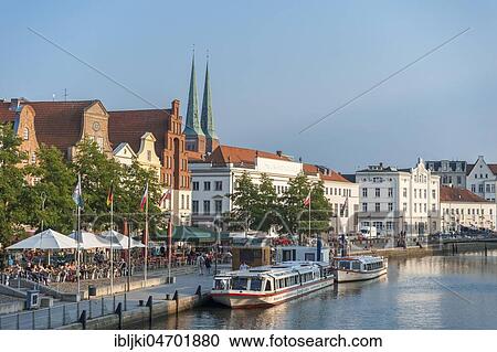 Stock Image - Mooring on the Trave River, Old Town with Cathedral, Lübeck, Schleswig-Holstein, Germany, Europe. Fotosearch