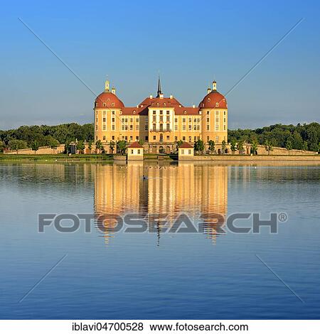 Stock Photo - Moritzburg Castle, Augustus the Strong's hunting lodge, water reflection in the lake, dawn, Saxony, Germany, Europe. Fotosearch