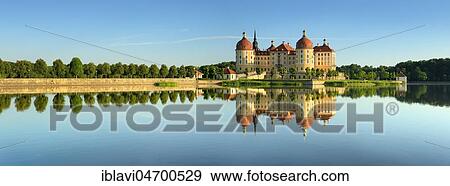 Moritzburg Castle, hunting lodge of Augustus the Strong, water reflection in the lake, Saxony, Germany, Europe View Large Photo Image Stock Photo - Moritzburg Castle, hunting lodge of Augustus the Strong, water reflection in the lake, Saxony, Germany, Europe. Fotosearch