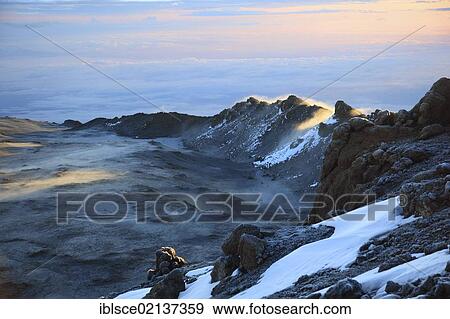 Morning fog in the crater of Mount Kilimanjaro, Tanzania, Africa View Large Photo Image Stock Photo - Morning fog in the crater of Mount Kilimanjaro, Tanzania, Africa. Fotosearch