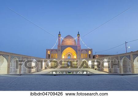 Stock Photograph - Mosque Masjed-e Agha Bozorg at dusk, Kashan, Iran, Asia. Fotosearch
