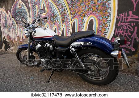 Motorbike and graffiti in the San Lorenzo district, Rome, Italy, Europe View Large Photo Image Stock Photo - Motorbike and graffiti in the San Lorenzo district, Rome, Italy, Europe. Fotosearch
