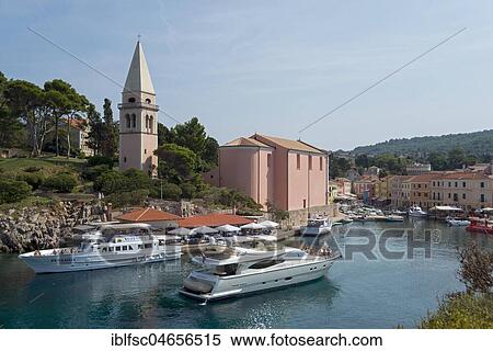 Motorboat drives to the harbour, with parish church Sv. Antun, Veli Losinj, island Losinj, Kvarner Gulf Bay, Croatia, Europe View Large Photo Image Stock Photography - Motorboat drives to the harbour, with parish church Sv. Antun, Veli Losinj, island Losinj, Kvarner Gulf Bay, Croatia, Europe. Fotosearch