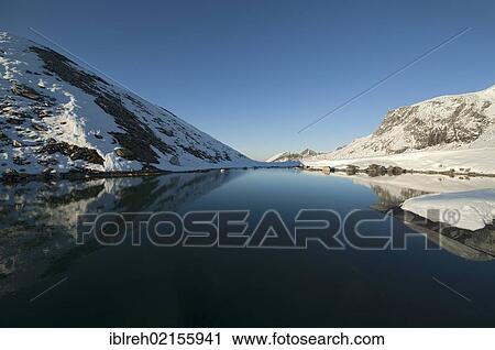 Mountain lake near Spannagel House, Tuxer Hauptkamm ridge, Zillertal Alps, Tyrol, Austria, Europe View Large Photo Image Stock Image - Mountain lake near Spannagel House, Tuxer Hauptkamm ridge, Zillertal Alps, Tyrol, Austria, Europe. Fotosearch