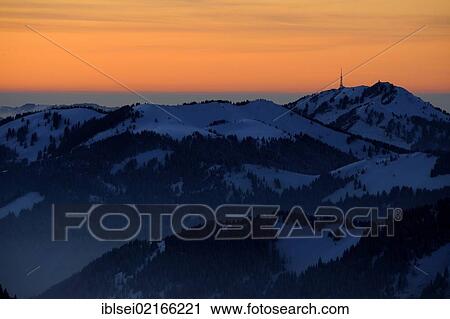 Mountain peaks with a sea of fog and a transmitter tower at sunset, Pfronten, Allgaeu, Bavaria, Germany, Europe View Large Photo Image Stock Image - Mountain peaks with a sea of fog and a transmitter tower at sunset, Pfronten, Allgaeu, Bavaria, Germany, Europe. Fotosearch
