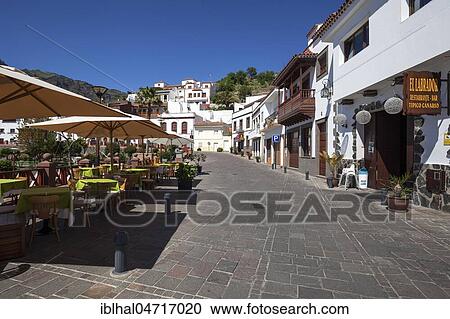 Stock Image - Mountain village Tejeda, street restaurant, Barranco de Tejeda, Gran Canaria, Canary Islands, Spain, Europe. Fotosearch