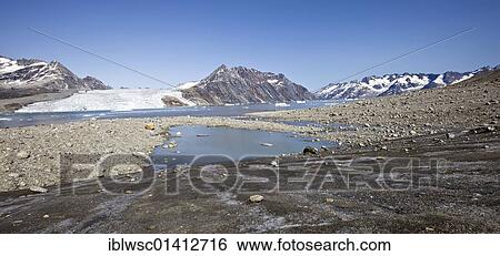 Stock Photograph - Mountains, glacier in the Sermiligaaq fjord, panorama, East Greenland, Greenland, Denmark, North America. Fotosearch
