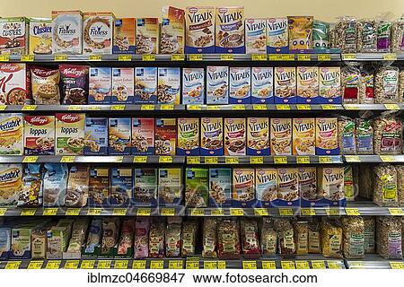 Muesli, different kinds on a shelf in a German supermarket, Germany, Europe View Large Photo Image Stock Photo - Muesli, different kinds on a shelf in a German supermarket, Germany, Europe. Fotosearch