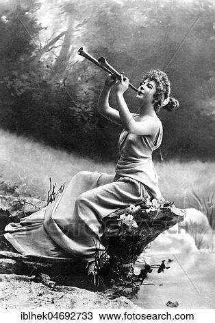 Musician, woman plays flute, set design, 1910s, Germany, Europe View Large Photo Image Stock Image - Musician, woman plays flute, set design, 1910s, Germany, Europe. Fotosearch