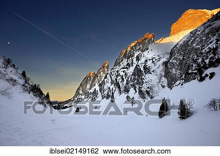 Narrow mountain valley at sunrise, Wildhaus, Toggenburg, St. Gallen, Switzerland, Europe View Large Photo Image Stock Image - Narrow mountain valley at sunrise, Wildhaus, Toggenburg, St. Gallen, Switzerland, Europe. Fotosearch