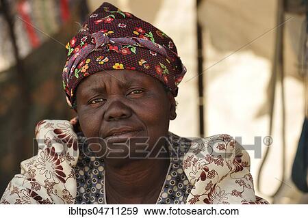 Stock Photo - Native woman with colorful headgear, portrait, near Spitzkoppe, Erongo region, Damaraland, Namibia, Africa. Fotosearch