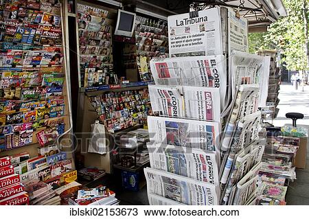 Stock Image - Newspaper kiosk with Spanish newspapers and magazines in Madrid, Spain, Europe. Fotosearch