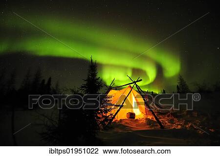 Stock Image - Northern Lights, aurora borealis above the Arctic, Hudson Bay, Manitoba, Canada, North America. Fotosearch